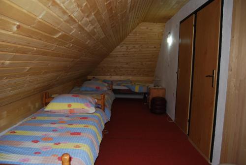 Cama o camas de una habitación en Kuća za odmor JAVOR Vlašić