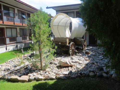 a boat sitting on a truck in a yard at Saddle West Casino Hotel in Pahrump