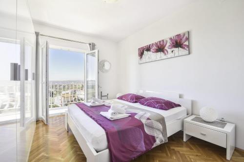 Posteľ alebo postele v izbe v ubytovaní Villa Joy- Paradise near Split