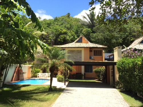 Casa frente praia na av beira mar com piscina