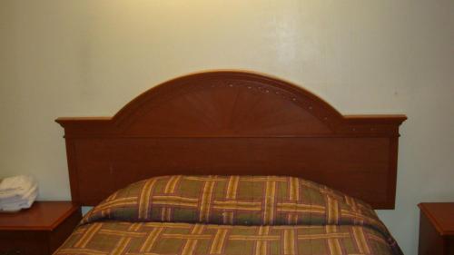 Ένα ή περισσότερα κρεβάτια σε δωμάτιο στο Beauty Rest Motel