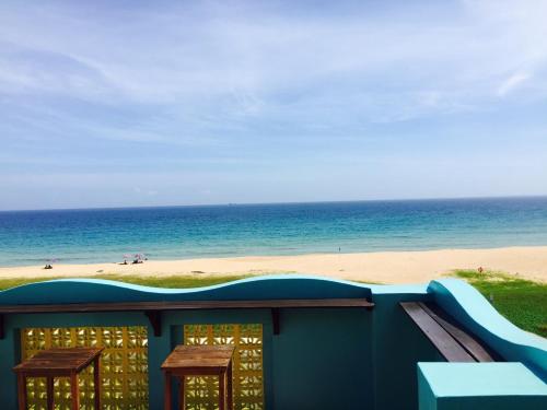 a view of the beach from a water slide at The Domed Tile B&B in Magong