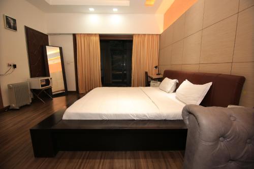 Avanti Tenantry-Luxurious Service Apartmentsにあるベッド