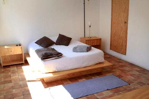 Ένα ή περισσότερα κρεβάτια σε δωμάτιο στο Coyoacan City Lofts