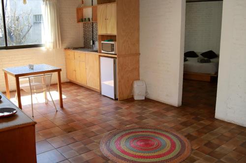 Η κουζίνα ή μικρή κουζίνα στο Coyoacan City Lofts