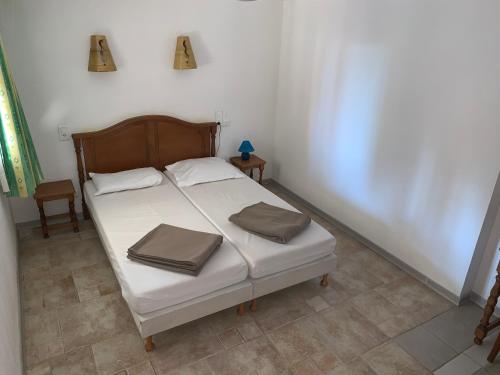 Postel nebo postele na pokoji v ubytování Apart'Hôtel Les 4 Sources