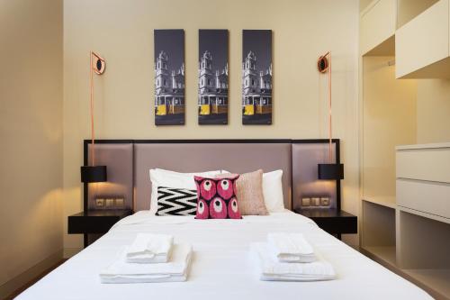 Katil atau katil-katil dalam bilik di Lisbon Finestay 8 Building Apartments