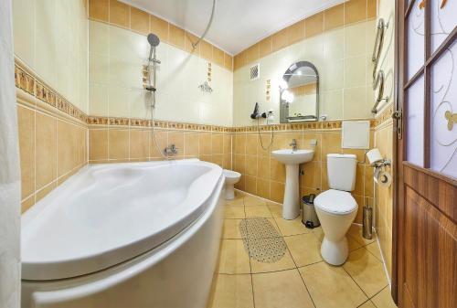 Koupelna v ubytování Resort Hotel Karpaty