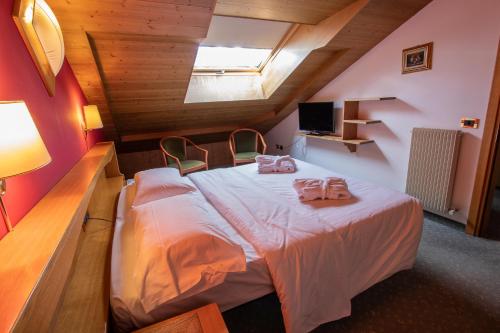Кровать или кровати в номере Hotel Santanton