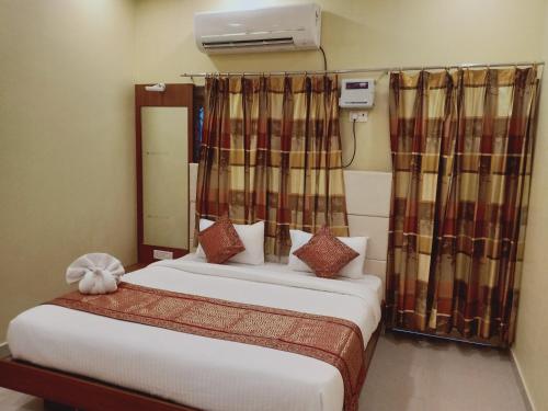 a bedroom with a bed and a window at RK appartment 3 bedroom with kitchen and balcony in Varanasi