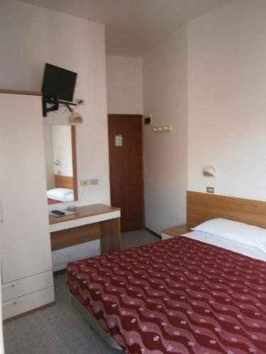 Ένα ή περισσότερα κρεβάτια σε δωμάτιο στο Hotel Goldene Rose