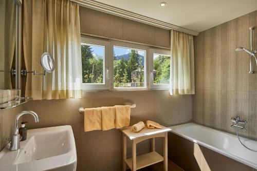 Ett badrum på Appartamenti La Sajun & Les Viles
