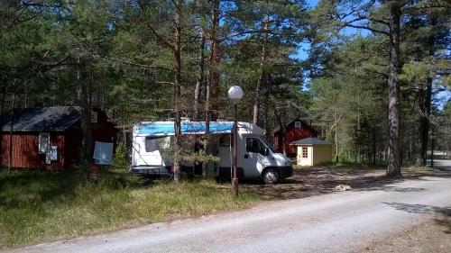 a van parked on the side of a road at Roosta Holiday Village in Elbiku