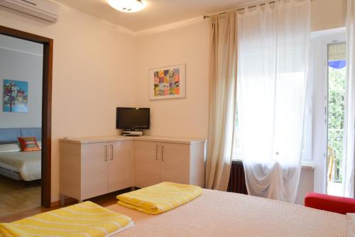 Letto o letti in una camera di Hotel Venezia