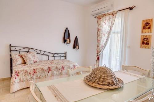 Кровать или кровати в номере Opalio Apartments