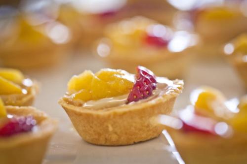 a small pastry with fruit on top of it at Bourbon Residence Barra da Tijuca - Rio de Janeiro in Rio de Janeiro