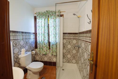 Ένα μπάνιο στο Hotel Rural Villa Ariadna