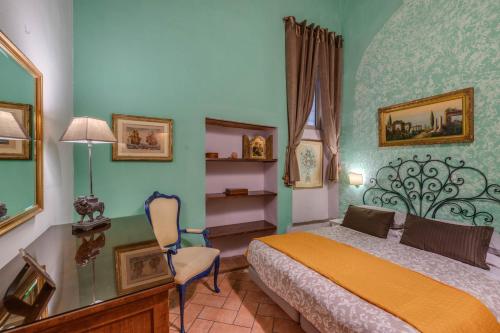 Una cama o camas en una habitación de Dante States Apartments