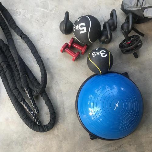 a blue frisbee and other items on the floor at Casa Chapolin Boutique Guesthouse in Palomino