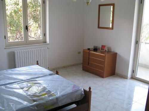 Postel nebo postele na pokoji v ubytování Villa Anna Tropea
