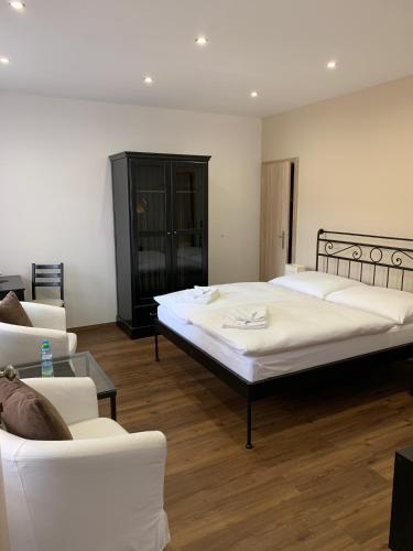 Ένα ή περισσότερα κρεβάτια σε δωμάτιο στο Apartma La Provence