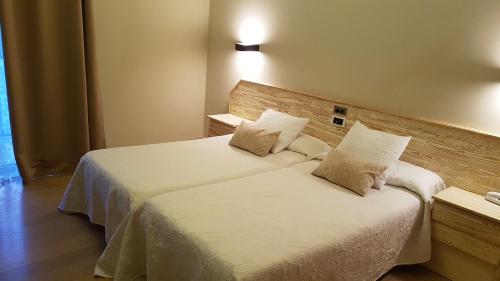 Posteľ alebo postele v izbe v ubytovaní Hotel Aguadoce - Louzao