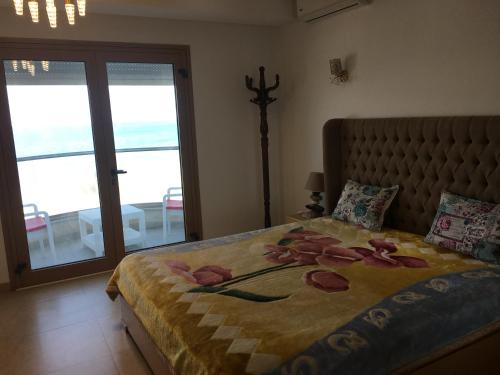 Postel nebo postele na pokoji v ubytování Immeuble l'Espadon