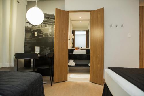 Postel nebo postele na pokoji v ubytování Palais Hotel