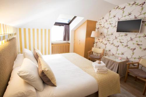 Кровать или кровати в номере Hotel La Casona de Llerices