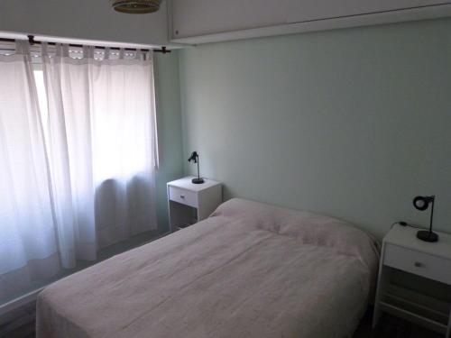 Кровать или кровати в номере Hermoso Apart Mar de Plata