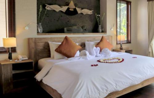 Cama o camas de una habitación en Harum Sari Ubud Private Villa