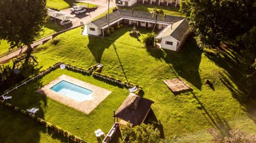 an aerial view of a backyard with a swimming pool at St Ives Midlands in Lidgetton