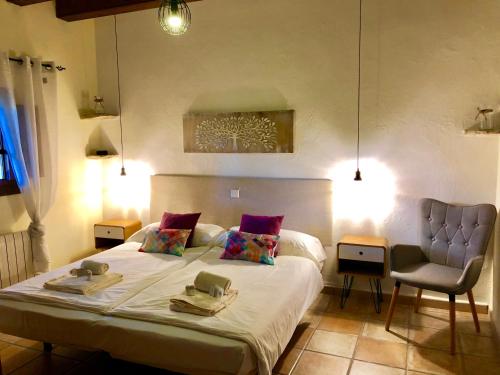 Postel nebo postele na pokoji v ubytování Agroturismo Can Guillo