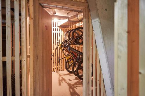 a bike in a bike rack in a room at AlpenParks Hotel & Apartment Sonnleiten in Saalbach Hinterglemm