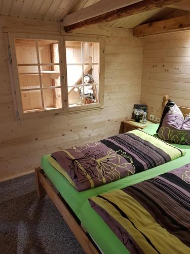 Кровать или кровати в номере Home&Classic Erlebnisscheune