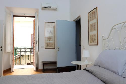Postel nebo postele na pokoji v ubytování Trevi Suite B&B