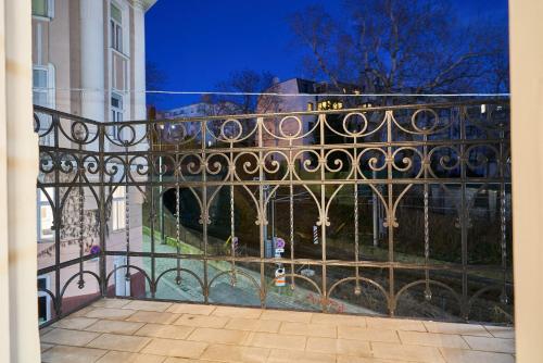 a view of a wrought iron gate of a house at Leuhusen Collection Vienna, Wien in Vienna