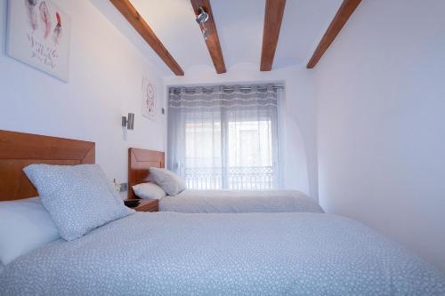 Posteľ alebo postele v izbe v ubytovaní apartamento las torres-botanico con 2 habitaciones