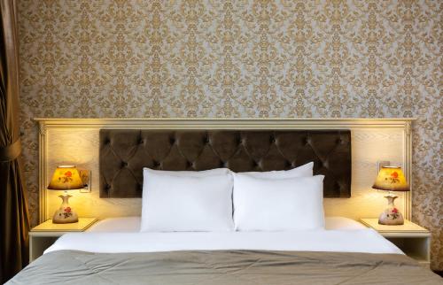 
Кровать или кровати в номере MODART Olympic Hotel & Beach
