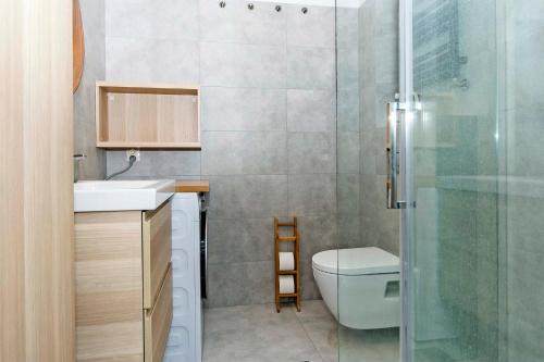 Kúpeľňa v ubytovaní Sand - Neptun Park by OneApartments