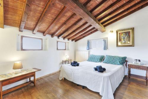 מיטה או מיטות בחדר ב-La Canonica di Alica