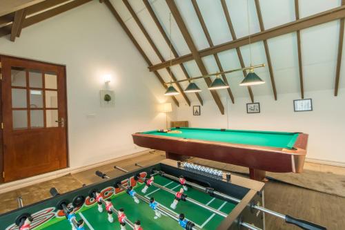 a billiard room with a pool table at The Lynden Grove in Nuwara Eliya