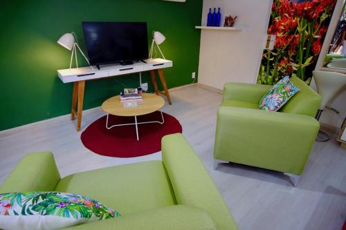 TV a/nebo společenská místnost v ubytování Milly's Touch Studios