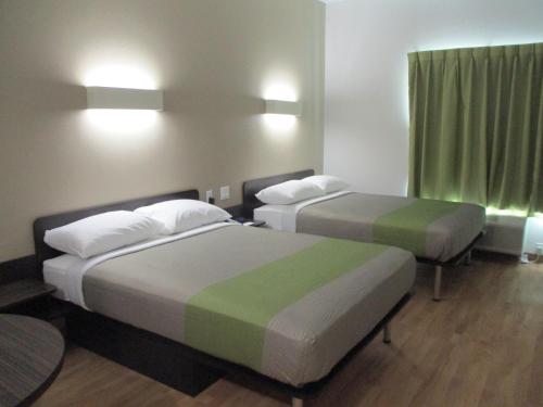Postel nebo postele na pokoji v ubytování Motel 6-Corpus Christi, TX
