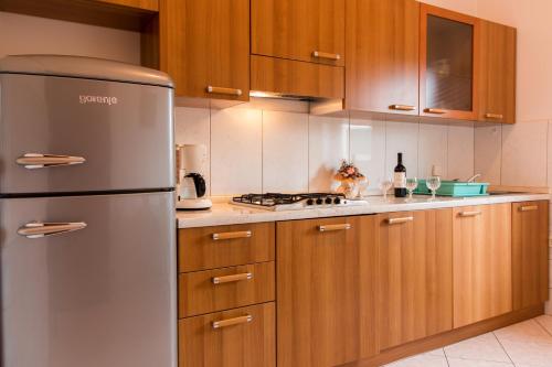 Kuchyň nebo kuchyňský kout v ubytování Apartments Filip
