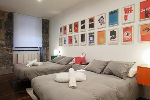 Voodi või voodid majutusasutuse Casco Viejo Comodidad y elegancia by Urban Hosts toas