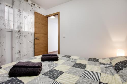 A bed or beds in a room at Vistas al Mar