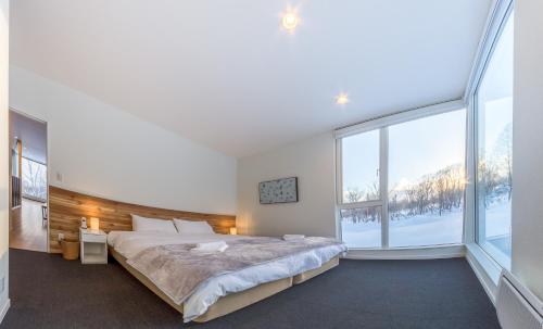 Una cama o camas en una habitación de Ikigai