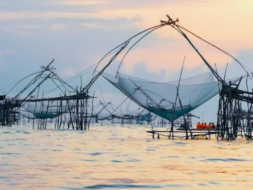 a group of nets in the water at Varni Homestay in Phatthalung