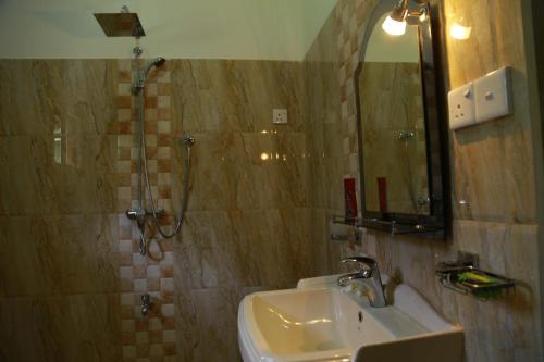 Ванная комната в White Villa Koggala